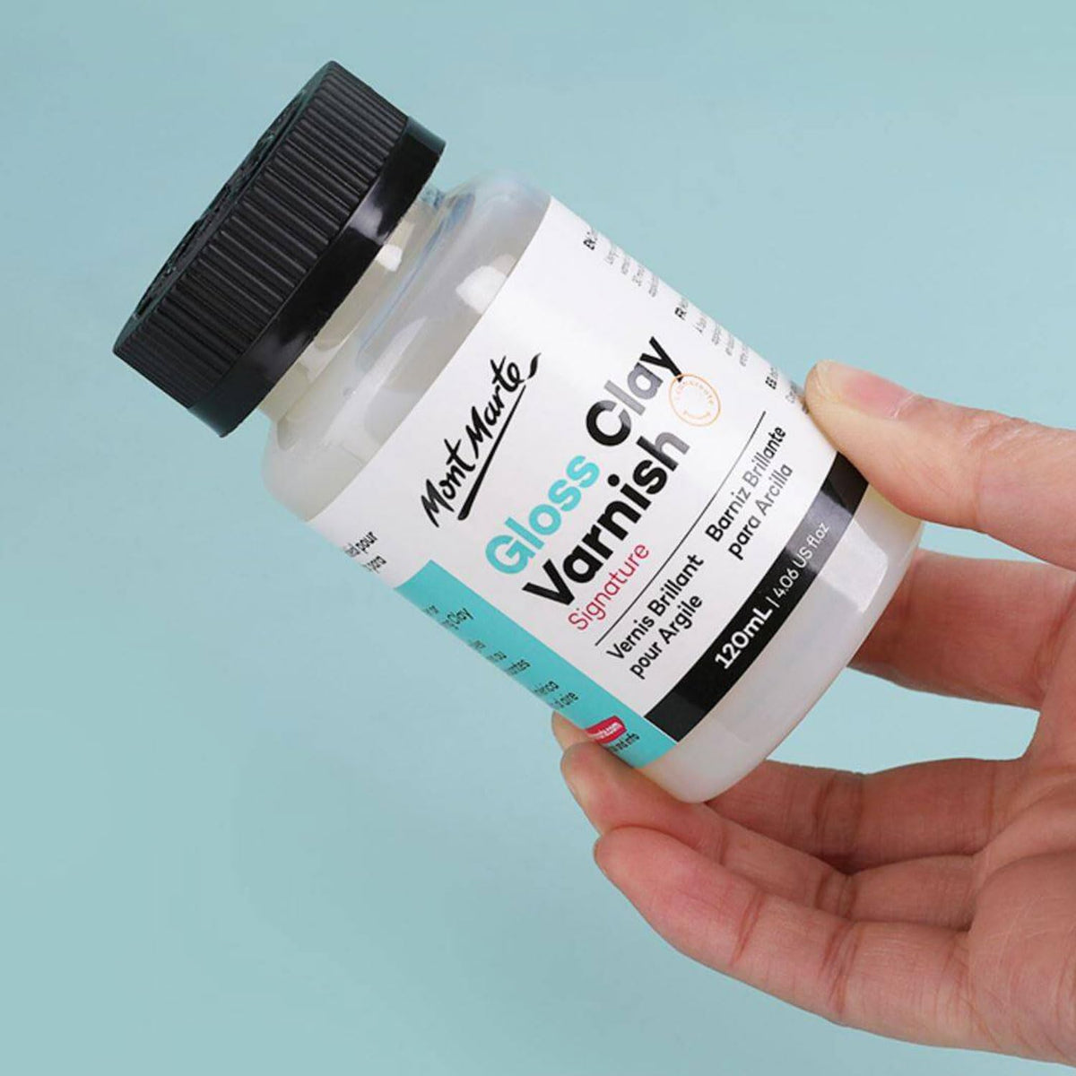 Mont Marte Gloss Varnish cap demonstrates convenient screw cap keeps varnish fresh