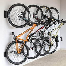 monTEK Swivel Bike Wall Mount four-pack shown for space-saving storage of bicycles