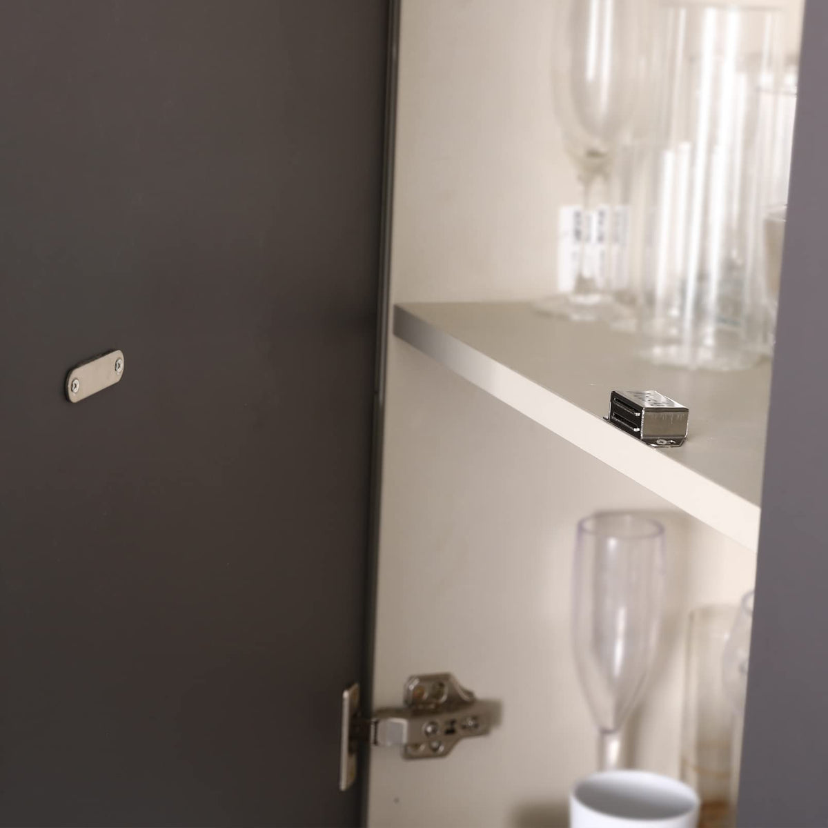 Mousike kitchen cupboard magnetic catch on a cabinet door