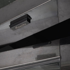 Mousike drawer/door latch showing robust magnetic hold.