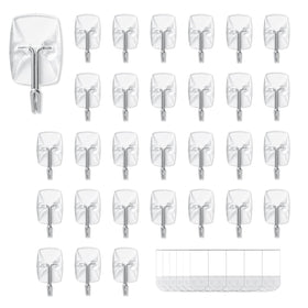 Movelyst 30 small hooks on a wall with adhesive strips for versatile organization.