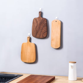 Easy-remove adhesive strip demonstrates simple wall rearrangement