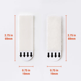 Movelyst strips applied to frame for secure, tool-free hanging