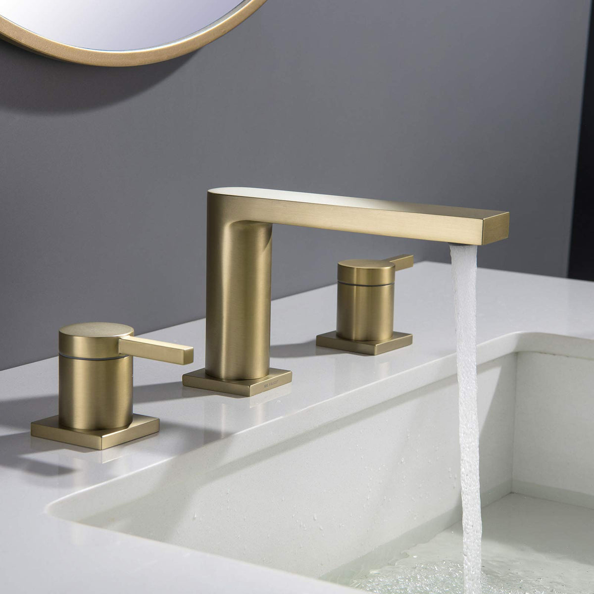 MR. FAUCET brushed gold handles offer precise temperature adjustments for daily use.