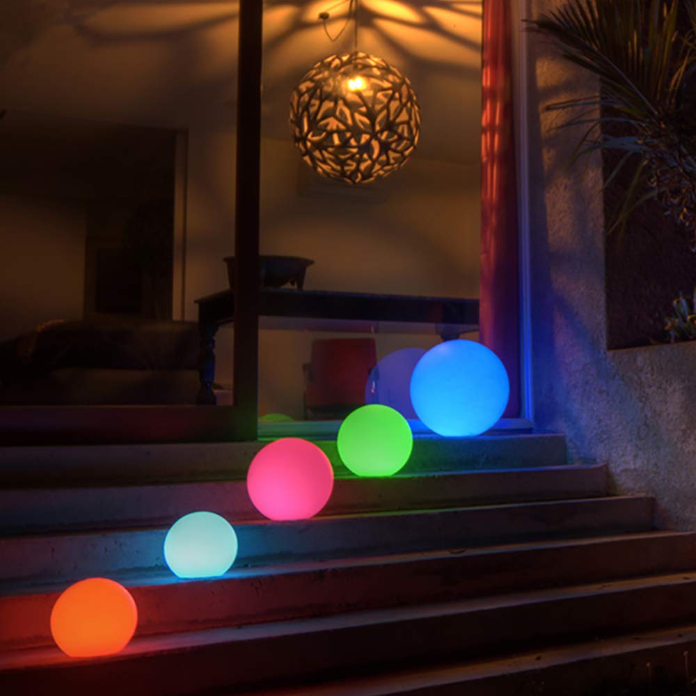 Mr.Go LED globe remote control for easy color and brightness adjustments.
