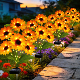 MRHEPHAESTUS solar sunflower bouquet with six heads lights outdoor spaces at dusk.