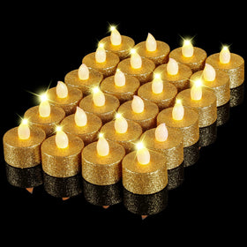 Mudder gold tea lights glitter closeup for elegant table decor.