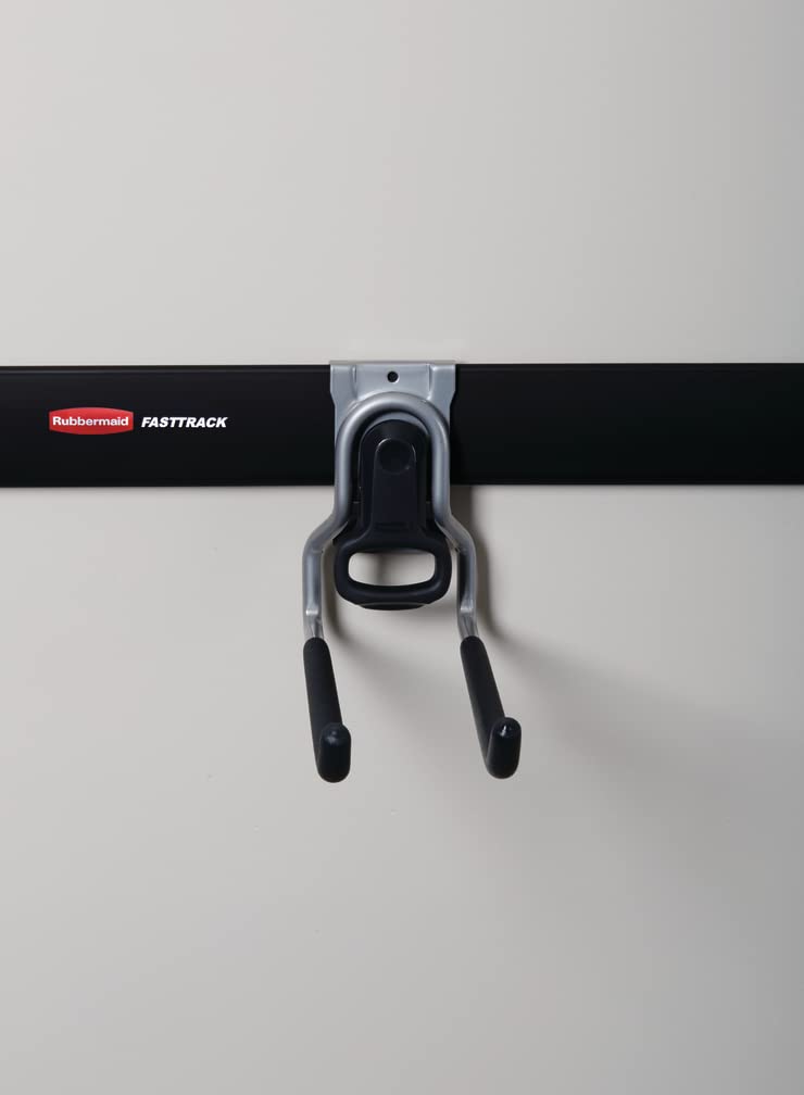 Hook holds long-handle tools neatly in place