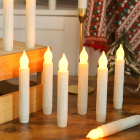 MUMCHASI 24-pack flameless taper candles provide safe, flickering ambience.
