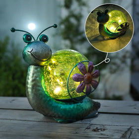 MUMTOP solar-powered dusk glow lantern lights patios at evening.