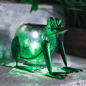 MUMTOP frog lantern by the pool creates soft night illumination.