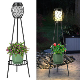 MXwcy 2-in-1 solar lamp with plant stand illuminates and displays potted plants.