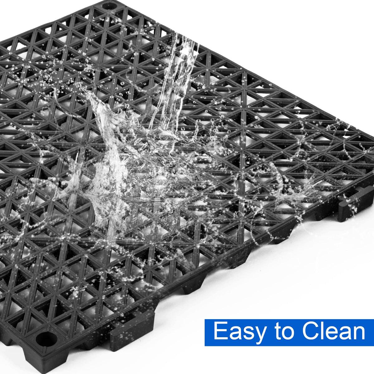 MYFAMIREA easy-clean mats being rinsed with a hose.