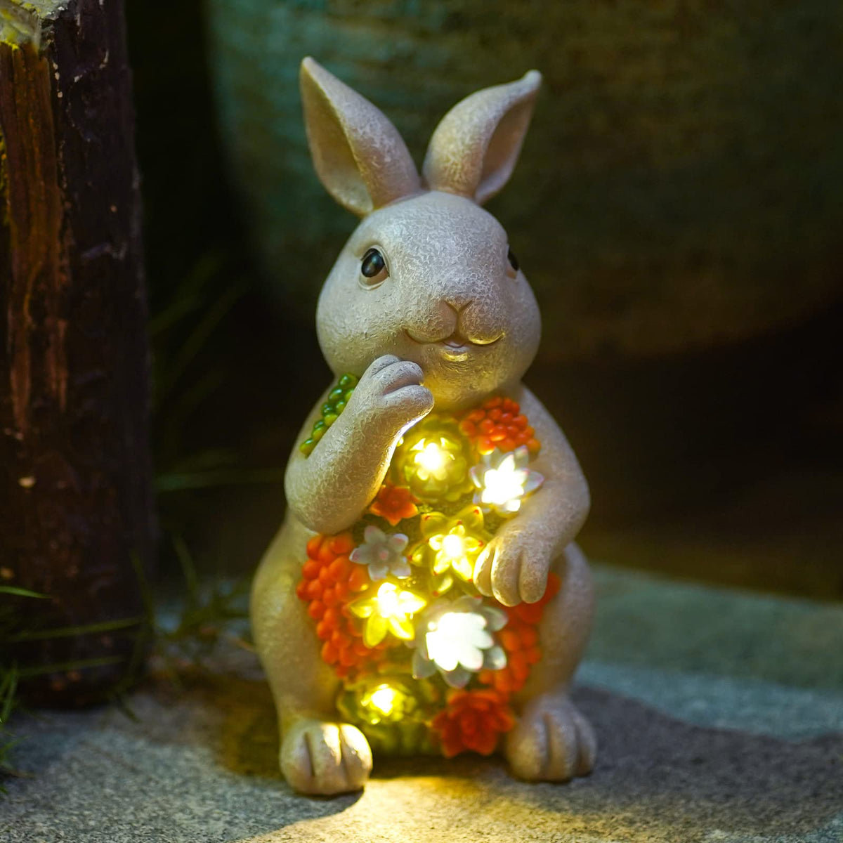 Nacome solar bunny statue with succulent glows softly at dusk for garden ambience.