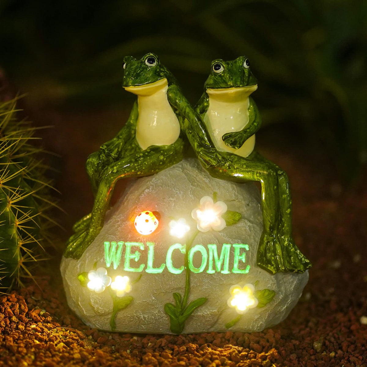 Nacome solar frog statue with succulent detail glowing at night for garden ambiance
