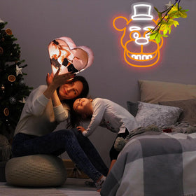 Nacynacy Bear Neon Sign as Christmas decor enhances festive mood.