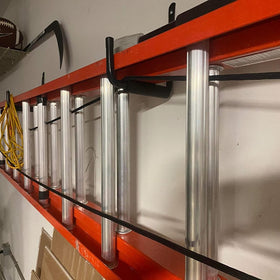 Naikozmo garage storage hooks installed on a wall for clutter-free space