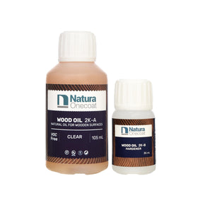 Natura Onecoat Wood Oil bottle on wood shows fast-drying interior finish.