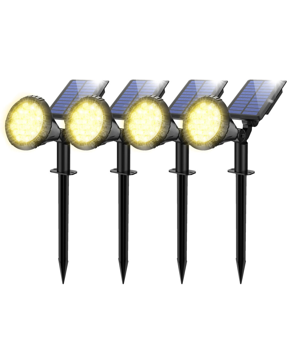 NBKLS four-pack solar spot lights seen from the front for yard illumination options.