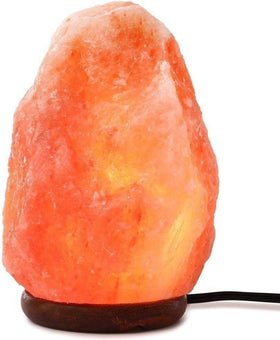 Natural texture of handcrafted Needs&Gifts salt lamp on wood base.