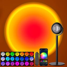 Neroupe sunset lamp projector in a cozy bedroom setup for relaxing mood lighting