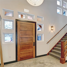 Newhouse surface-mount lighted push button enhances visibility and entry access.