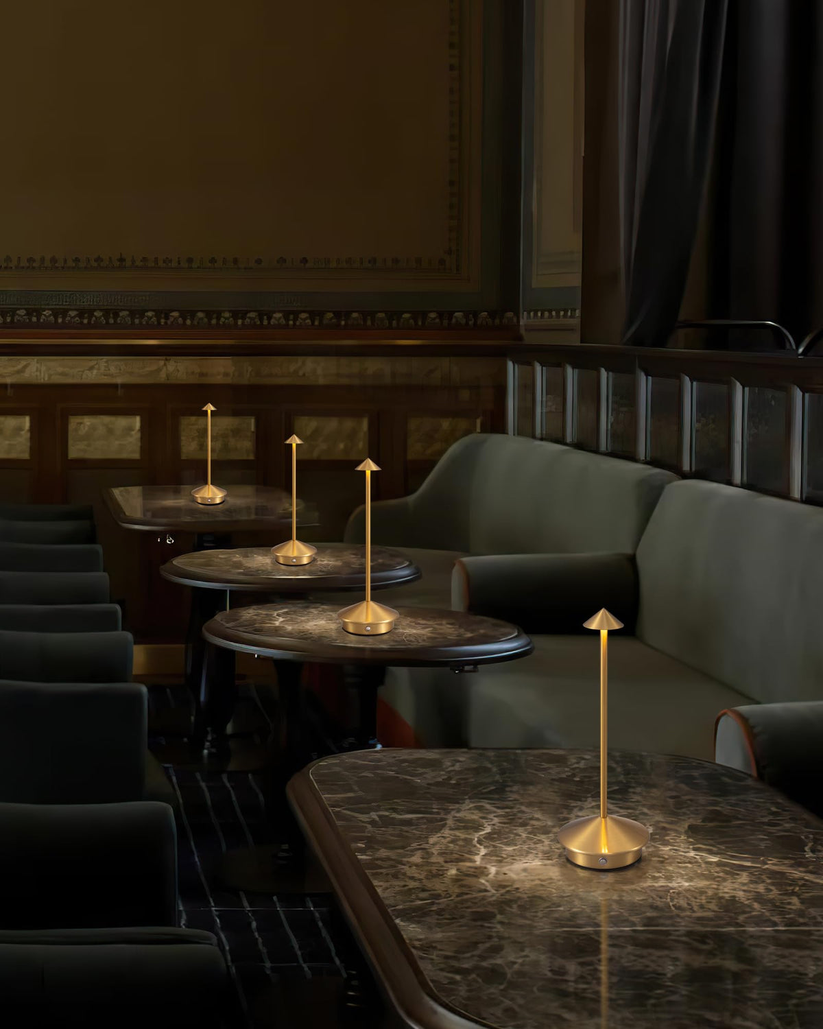 NEWSEE gold-finish lamp enhances dining room ambiance with warm light.