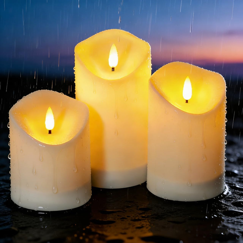 Nimiko solar outdoor flameless candle 4-inch height glows in a garden setting.