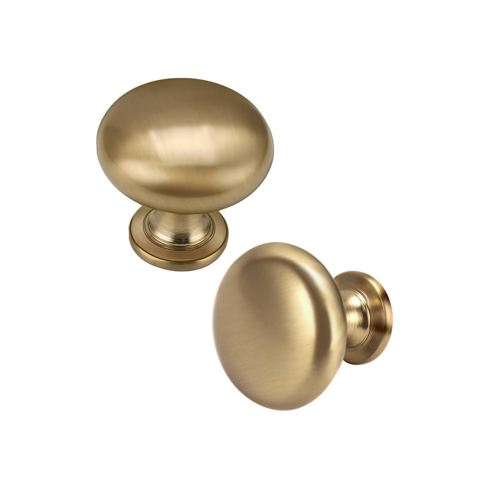 NIZADO cabinet knobs close-up in brushed gold aged brass finish showing texture