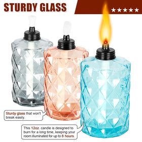 Nonley glass tabletop torch purple glow adds vibrant yard decor.