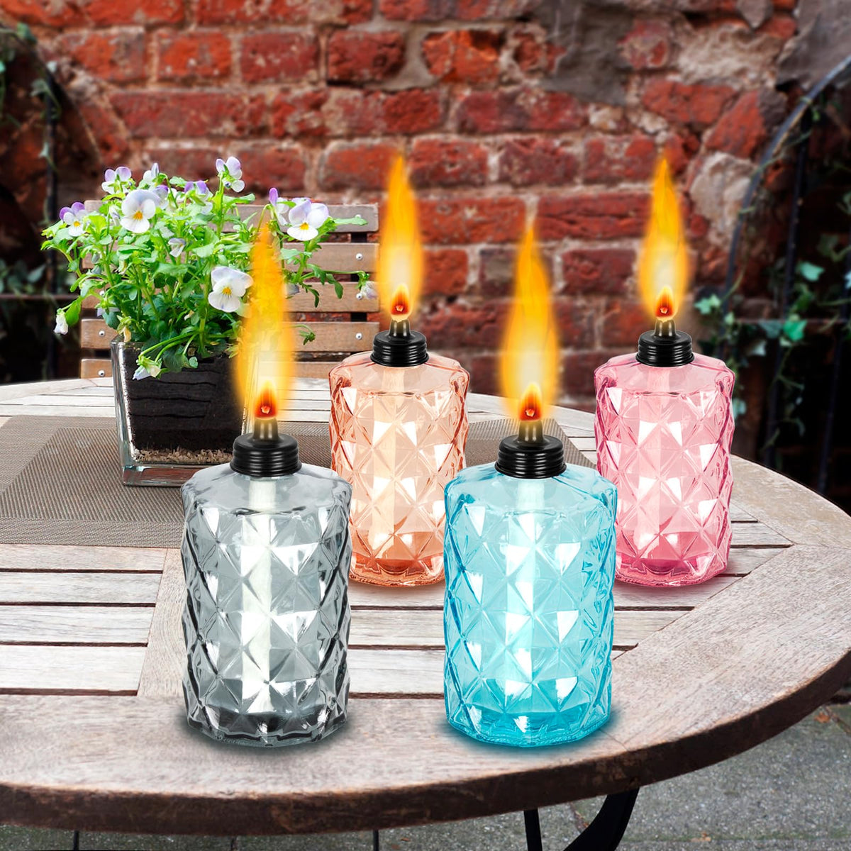 Nonley glass tabletop torch close-up shows refillable 12 oz canister.