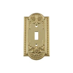 Nostalgic Warehouse Meadows switch plate detail, brass craftsmanship for vintage appeal.