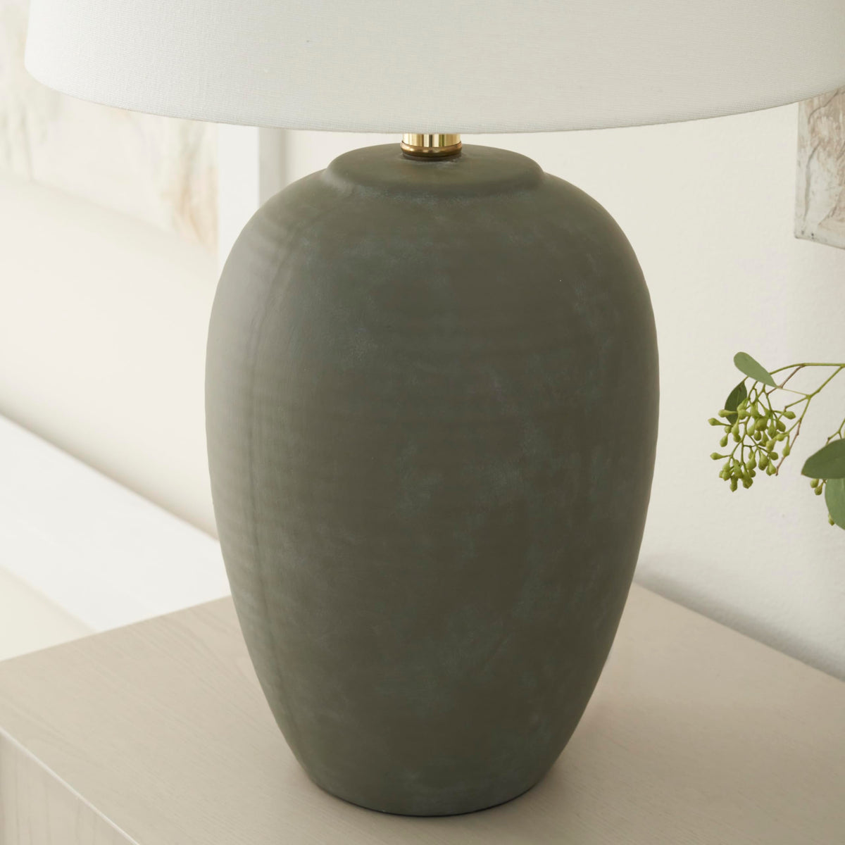 Nourison olive green lamp features 3-way switch for adjustable brightness