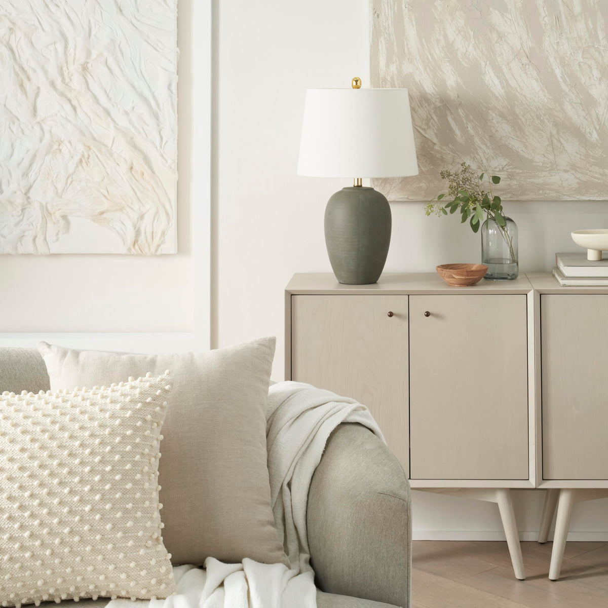 Nourison olive green lamp with tapered shade diffuses light for cozy evenings