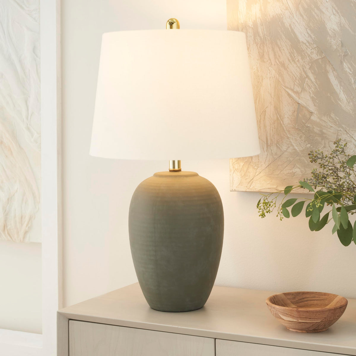 Nourison Home urn-detail highlights ceramic texture, adding earthy charm to decor