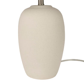 Nourison Home ceramic jar lamp complements living room decor.