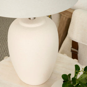 Nourison Home lamp on nightstand creates inviting evening ambiance.