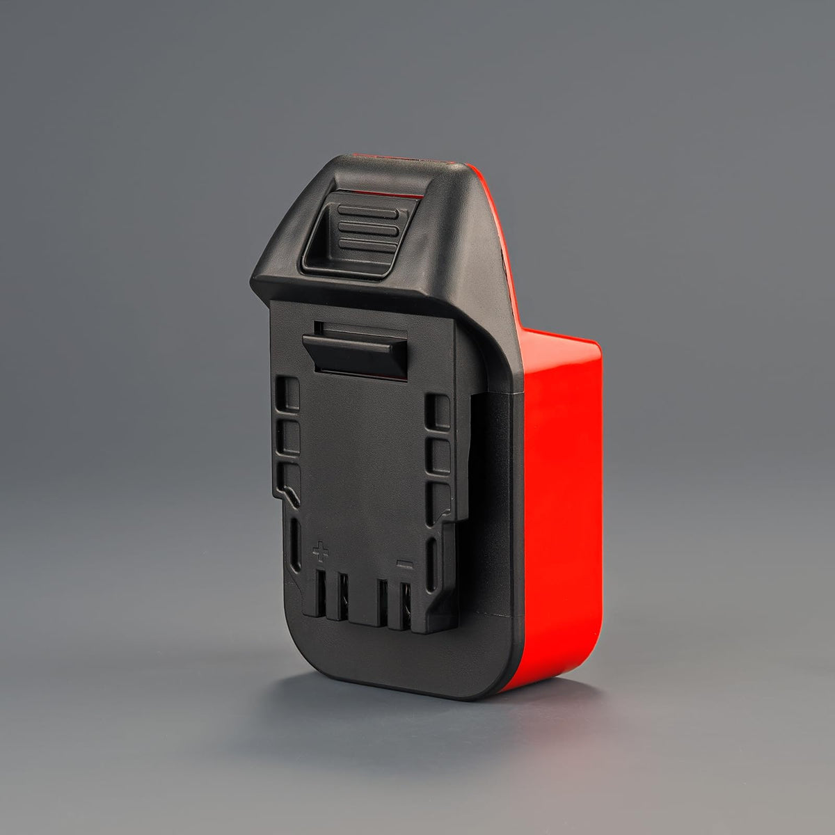 NovaQuantic adapter in use powers Hercules 20V tools with M18 battery on the job.