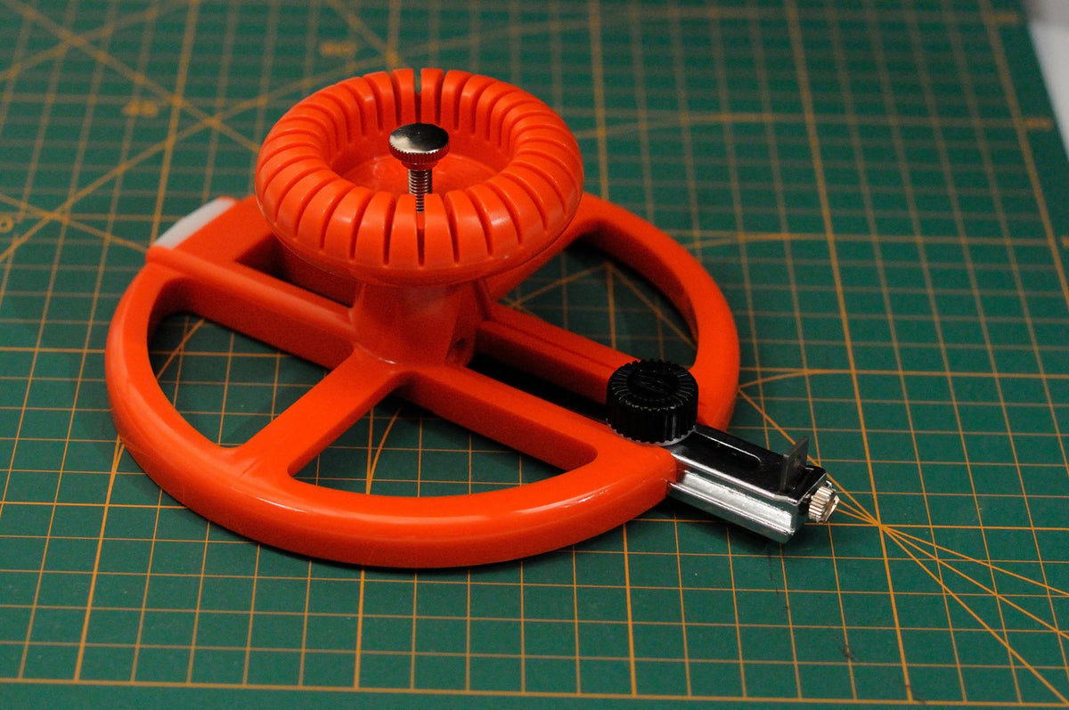 NT Cutter circle cutter used on drywall for precise edge control.