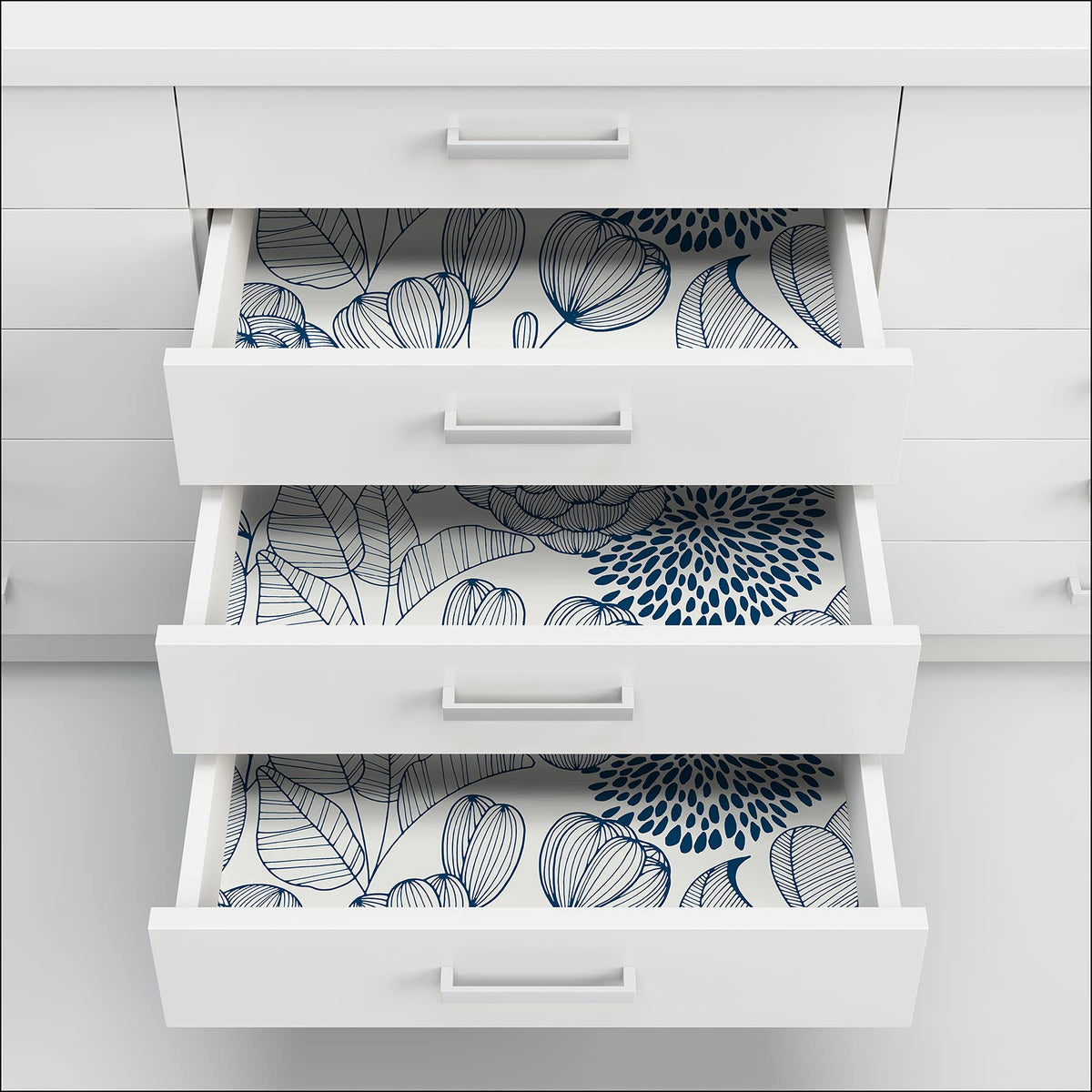 NuWallpaper Navy Secret Garden adheres to smooth surfaces; no sticky residue.