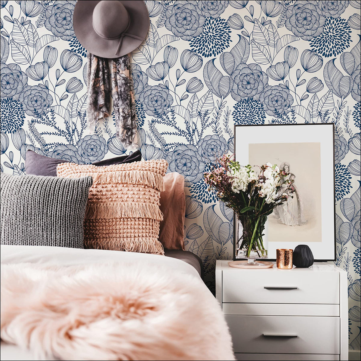 NuWallpaper Navy Secret Garden wall decor; transforms space without long renovations.