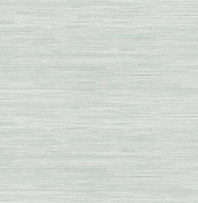 NuWallpaper Whisper Blue grasscloth roll showing textured surface for stylish makeover