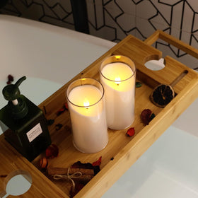 Three-pack packaging of NURADA flameless candles.