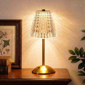 Nusogon rechargeable cordless table lamp with crystal shade for warm bedroom ambiance.