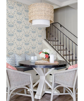NuWallpaper Blue Shellby damask close-up shows pastel motifs for coastal styling.