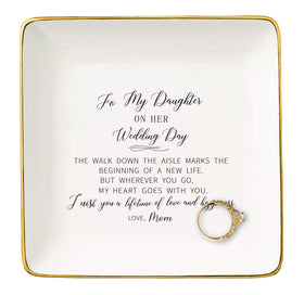 NZY ceramic jewelry tray closeup with golden edges and organized jewelry.