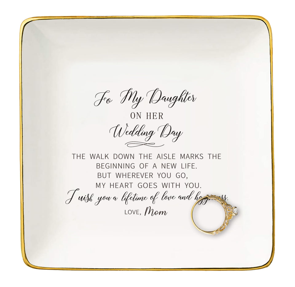 NZY ceramic jewelry tray closeup with golden edges and organized jewelry.