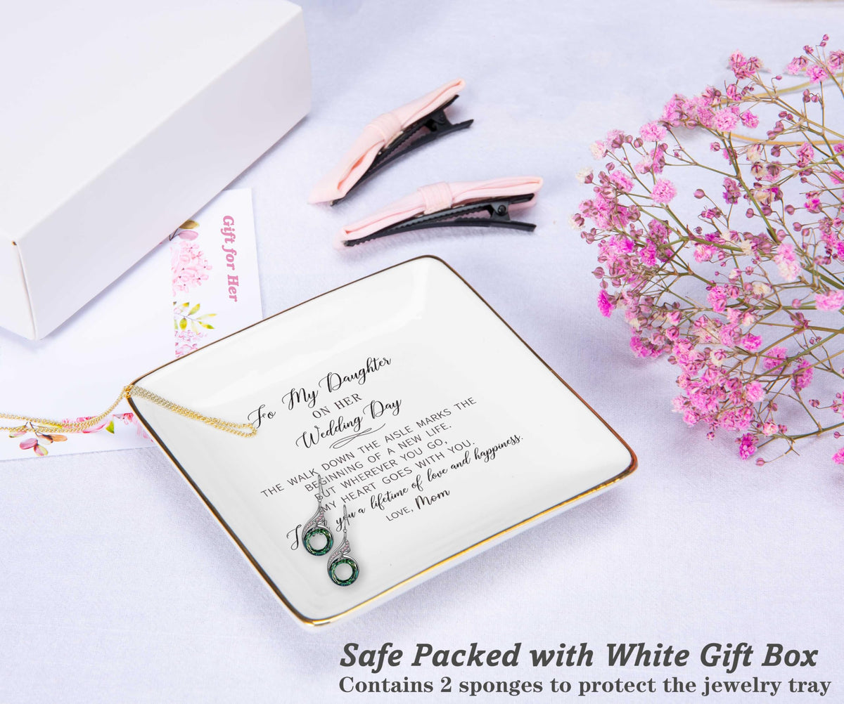 NZY jewelry tray packaging closeup showing white gift box and protection.