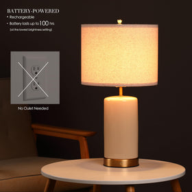 O’Bright Dune cordless lamp on a bedside table for reading.