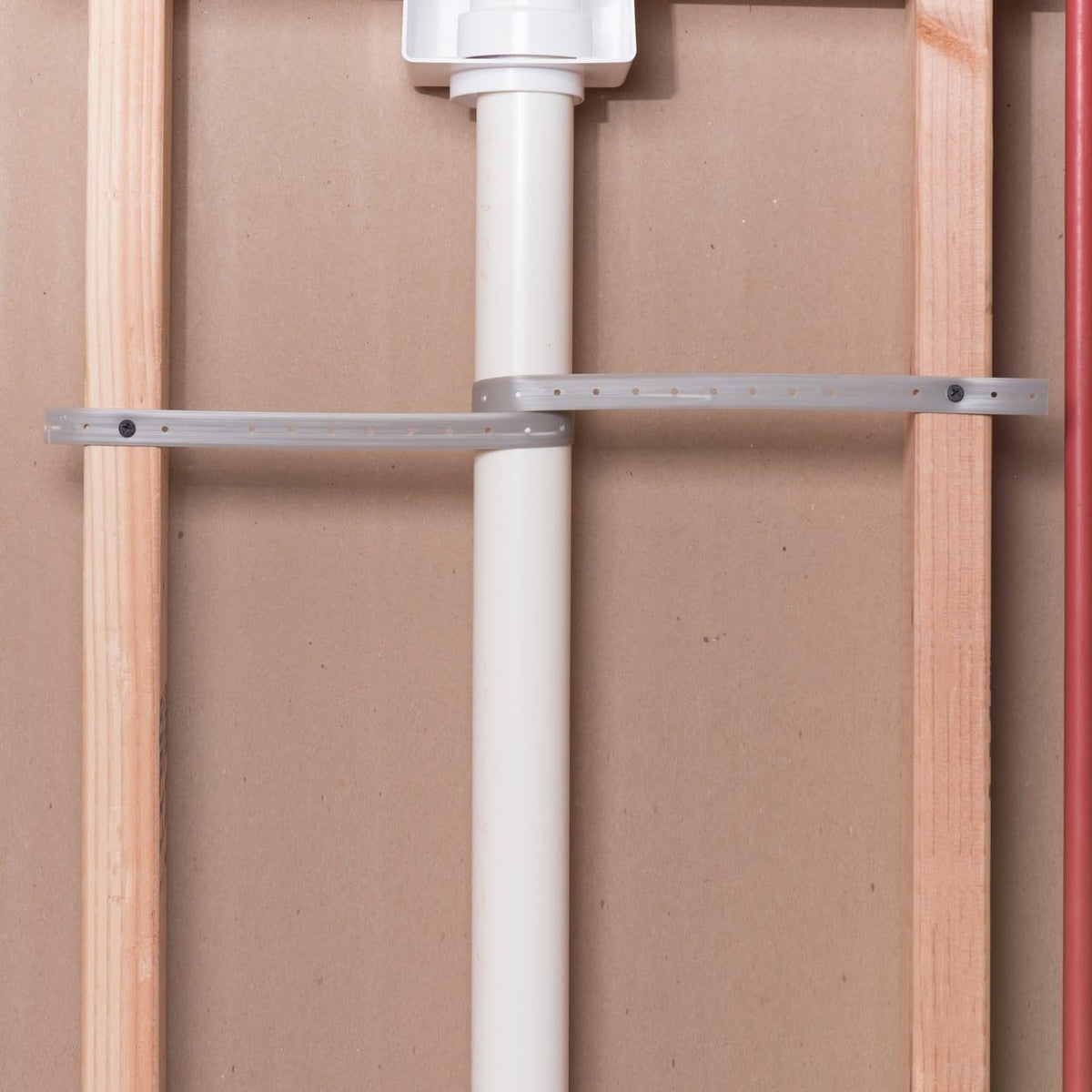 Oatey pipe strap installing pipes to joists for secure mounting